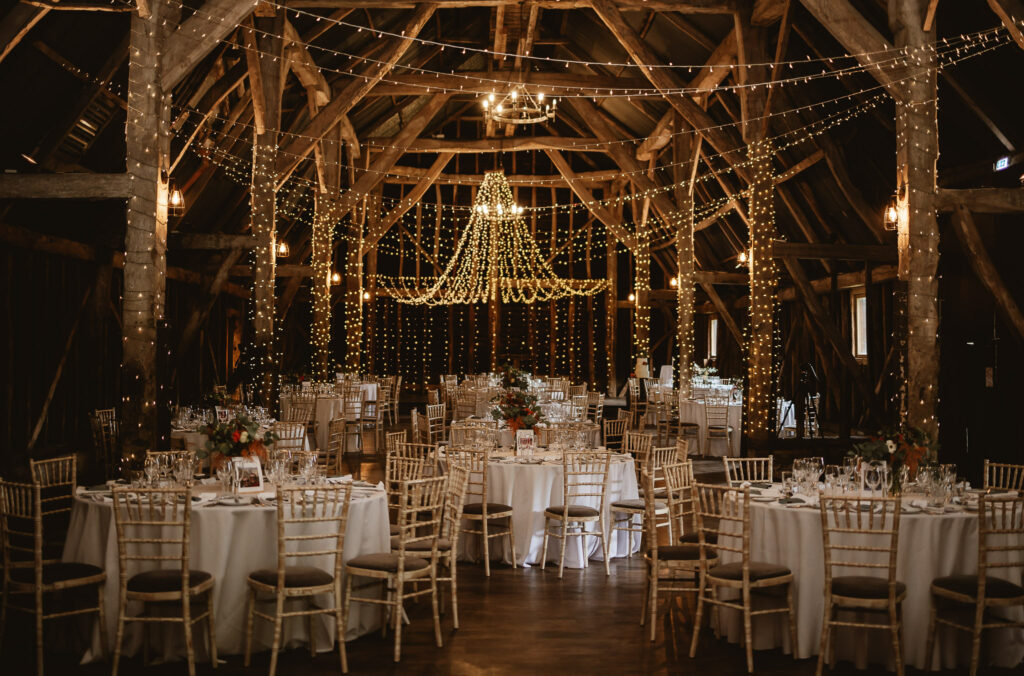 fairy lights in a wooden rustic wedding barn